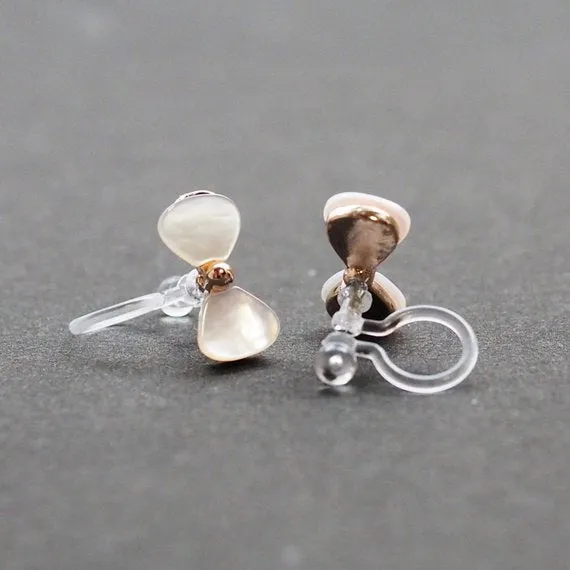 Mother Of Pearl Bow Tie Invisible Clip On Stud Earrings (Gold tone)