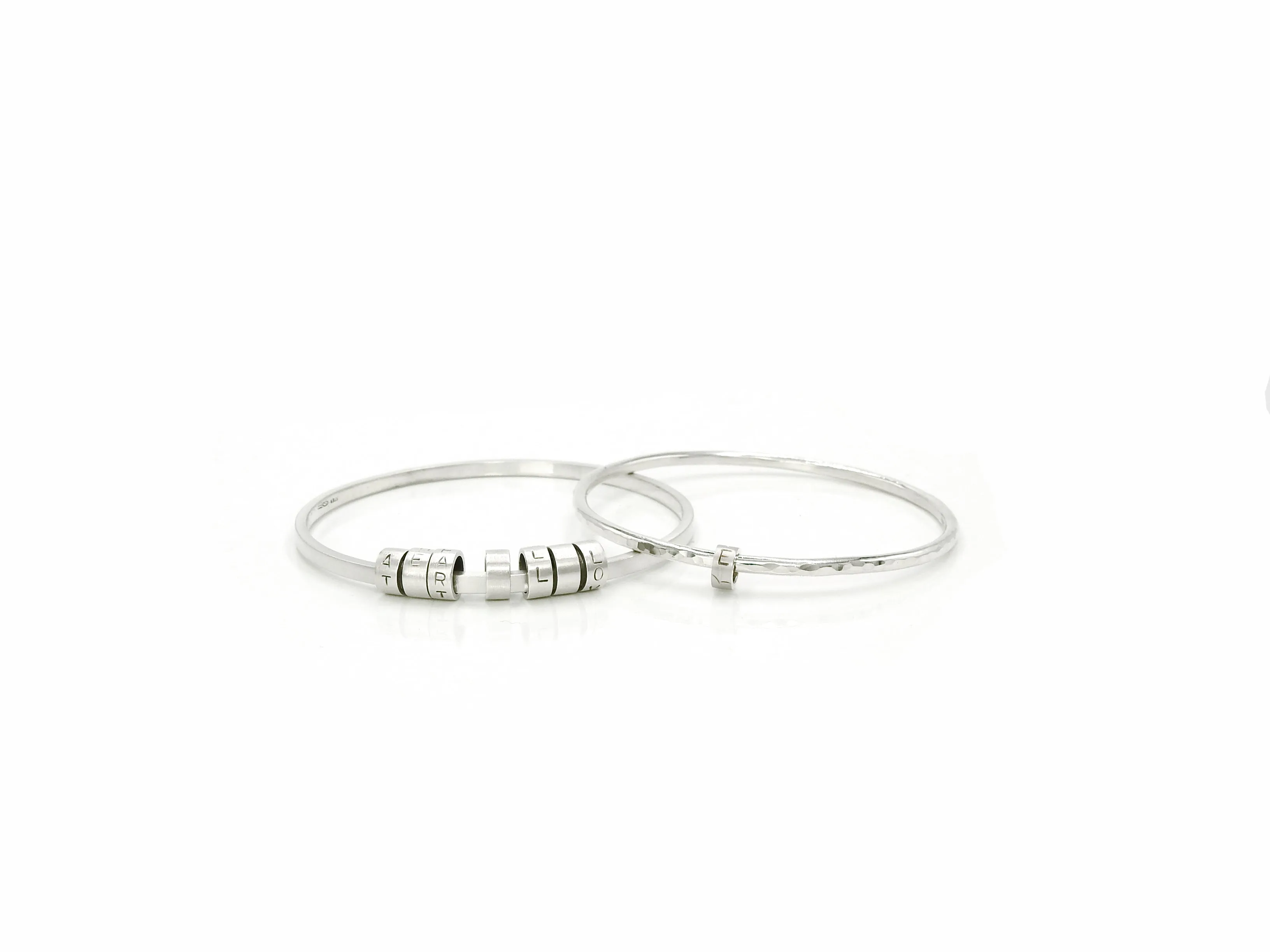 Rhythmic "LOVE" bangle