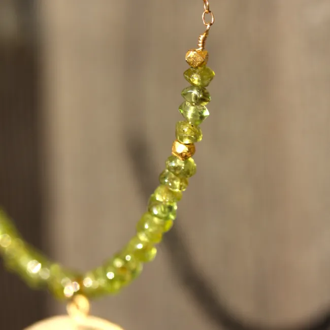 Tequila Sunrise Necklace - 18k Gold Swirl Charm, Green Peridot & 18k Gold Nuggets Necklace.