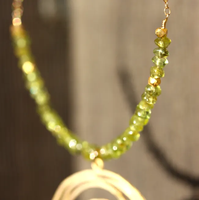 Tequila Sunrise Necklace - 18k Gold Swirl Charm, Green Peridot & 18k Gold Nuggets Necklace.
